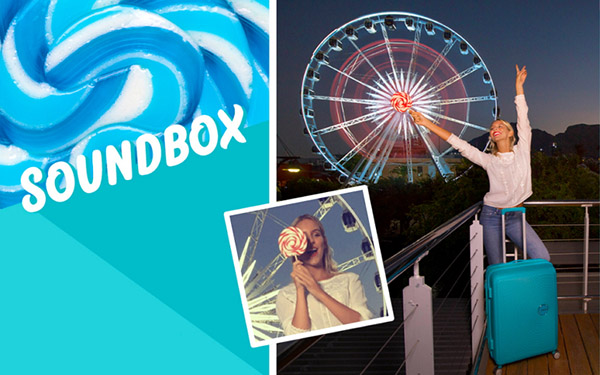 夏の道：明るいスーツケースAmerican Tourister Soundbox